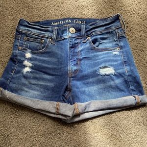High rise, blue American eagle shorts.
